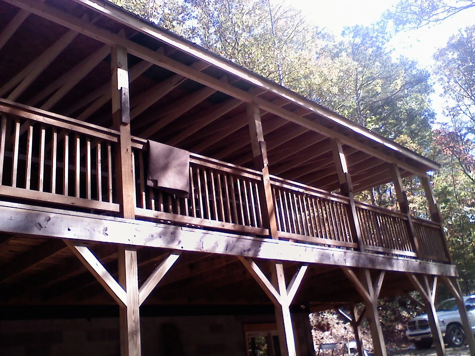 Timber framing under a new elevated porch and deck — Roof Leak Repair in Methuen by Roofing Brothers